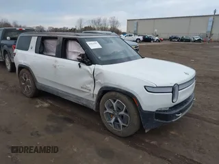 2024 Rivian R1S Adventure z VIN 7PDSGABA4RN039358, wystawiony jako IAAI lot #41824503 z przebiegiem 15 656 mil mil oraz . Historia ofert i sprzedaży dostępna na DreamBid. Obrazek 1.