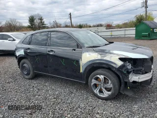2023 Honda HR-V EX-L with VIN 3CZRZ2H74PM718629, listed as a Copart auction lot 52628595 with 104,108 mi miles and Salvage title. Bid and sale history available at DreamBid. Image 4.