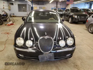 2003 Jaguar S-Type z VIN SAJEA01U93HM84195, wystawiony jako Copart lot #54300574 z przebiegiem 98 820 mil mil oraz Czysty tytuł • Clean title. Historia ofert i sprzedaży dostępna na DreamBid. Obrazek 5.