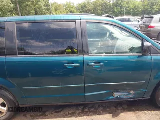 2009 Dodge Grand Caravan SE with VIN 2D8HN44E09R642823, listed as a IAAI auction lot 42606693 with 132,967 mi miles and . Bid and sale history available at DreamBid. Image 13.