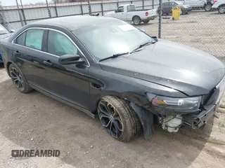 2013 Ford Taurus SHO z VIN 1FAHP2KT6DG174191, wystawiony jako IAAI lot #41752293 z przebiegiem 147 607 mil mil oraz . Historia ofert i sprzedaży dostępna na DreamBid. Obrazek 1.