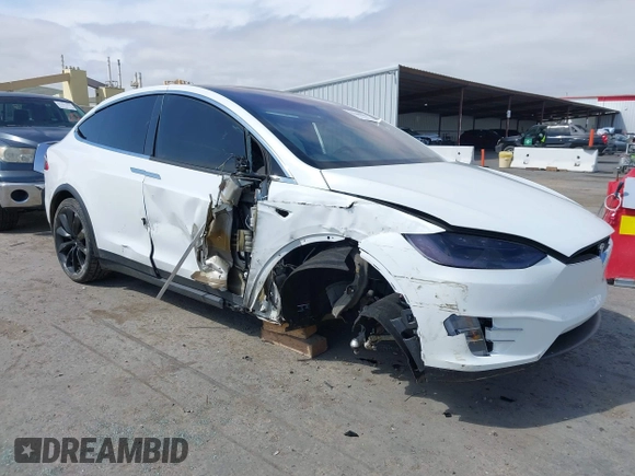 2021 Tesla Model X Long Range Plus with VIN 5YJXCBE23MF321243, listed as a IAAI auction lot 42100580 with 59,878 mi miles and . Bid and sale history available at carsss.com. Image 1.