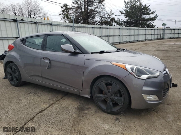 2015 Hyundai Veloster with VIN KMHTC6AD2FU235151, listed as a Copart auction lot 43692675 with 105,798 mi miles and Clean Title. Bid and sale history available at carsss.com. Image 4.