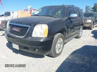 2008 GMC Yukon SLT w/4SB with VIN 1GKFC13058R146926, listed as a IAAI auction lot 41855642 with 207,257 mi miles. Bid and sale history available at carsss.com. Image 2.