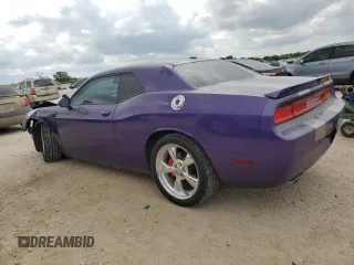 2013 Dodge Challenger R/T with VIN 2C3CDYBTXDH671611, listed as a Copart auction lot 53190985 with 54,331 mi miles and Salvage Title. Bid and sale history available at carsss.com. Image 2.