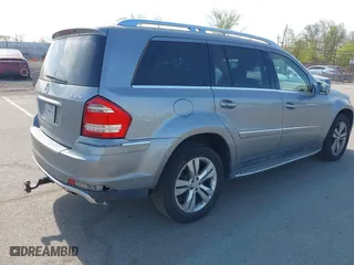 2011 Mercedes-Benz GL-Class GL 450 with VIN 4JGBF7BE3BA740269, listed as a IAAI auction lot 42098338 with 146,055 mi miles. Bid and sale history available at carsss.com. Image 4.