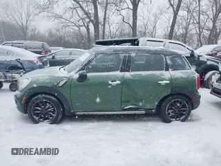 2015 MINI Countryman S z VIN WMWZC5C59FWP48946, wystawiony jako IAAI lot #41298127 z przebiegiem 106 293 mil mil oraz . Historia ofert i sprzedaży dostępna na DreamBid. Obrazek 14.