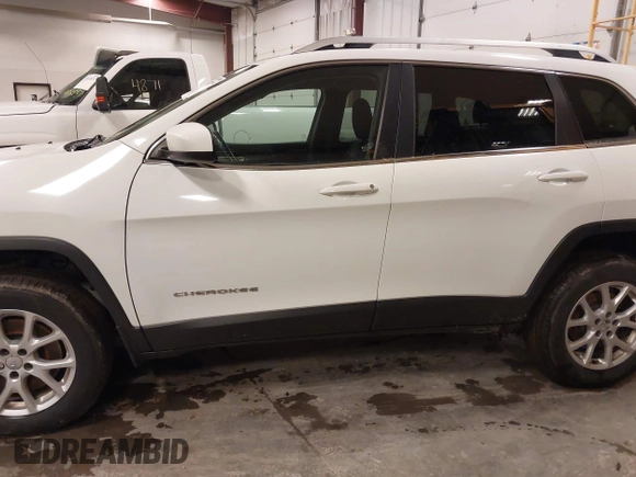 2014 Jeep Cherokee Latitude with VIN 1C4PJMCS4EW318353, listed as a IAAI auction lot 41945598 with 179,425 mi miles and . Bid and sale history available at DreamBid. Image 14.