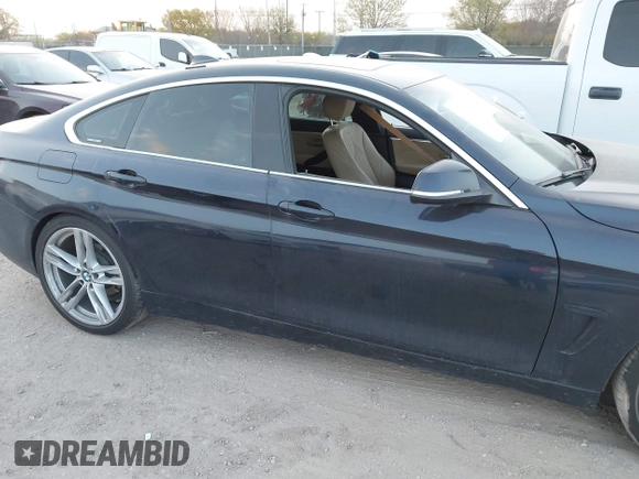 2018 BMW 4 Series 430i with VIN WBA4J1C5XJBG80412, listed as a IAAI auction lot 41788641 with 116,464 mi miles and . Bid and sale history available at carsss.com. Image 14.