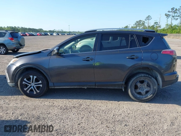 2016 Toyota RAV4 LE with VIN JTMZFREV7GJ065267, listed as a IAAI auction lot 42011267 with 180,127 mi miles. Bid and sale history available at carsss.com. Image 14.