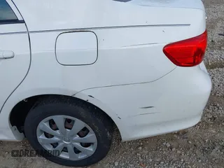 2010 Toyota Corolla with VIN 2T1BU4EE1AC312151, listed as a IAAI auction lot 42761709 with 121,356 mi miles and . Bid and sale history available at DreamBid. Image 6.