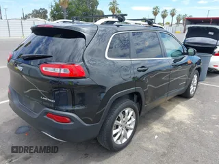 2014 Jeep Cherokee Limited z VIN 1C4PJLDB9EW162416, wystawiony jako IAAI lot #42779797 z przebiegiem 158 581 mil mil oraz . Historia ofert i sprzedaży dostępna na DreamBid. Obrazek 4.