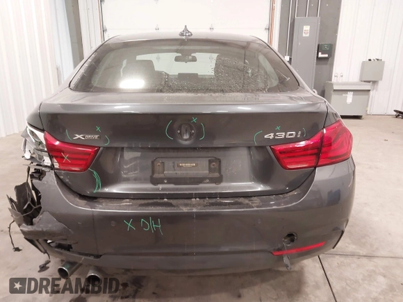 2018 BMW 4 Series 430i xDrive with VIN WBA4J3C52JBG95207, listed as a IAAI auction lot 41509392 with 68,193 mi miles and . Bid and sale history available at DreamBid. Image 16.
