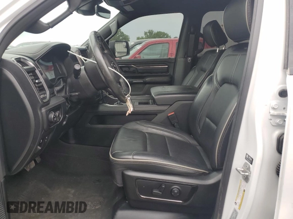 2023 Ram 1500 Limited with VIN 1C6SRFHTXPN528522, listed as a Copart auction lot 59008225 with 27,293 mi miles and Salvage title. Bid and sale history available at DreamBid. Image 7.