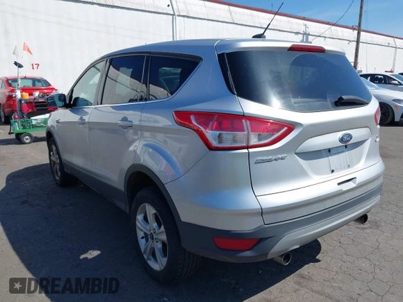 2013 Ford Escape SE with VIN 1FMCU9GX5DUB17091, listed as a IAAI auction lot 42047494 with 137,500 mi miles and . Bid and sale history available at DreamBid. Image 3.