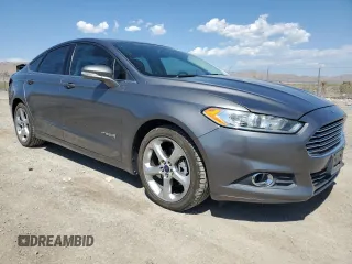 2014 Ford Fusion SE Hybrid with VIN 3FA6P0LU3ER306739, listed as a Copart auction lot 69887454 with 114,150 mi miles and Salvage title. Bid and sale history available at DreamBid. Image 4.