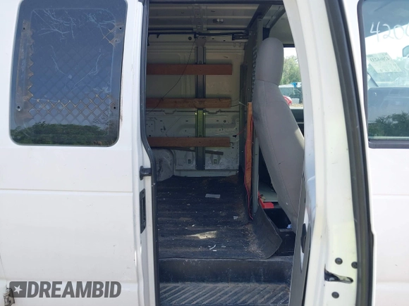 2009 Ford Econoline Cargo with VIN 1FTNE24W89DA31505, listed as a IAAI auction lot 42066233 with 267,327 mi miles. Bid and sale history available at carsss.com. Image 8.