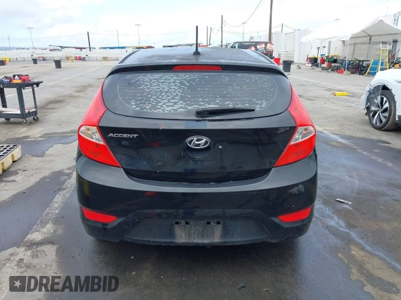 2013 Hyundai Accent GL with VIN KMHCT5AEXDU092644, listed as a IAAI auction lot 42078339 with 134,288 mi miles. Bid and sale history available at carsss.com. Image 16.