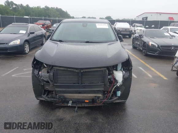 2020 Chevrolet Equinox LS with VIN 2GNAXHEVXL6282184, listed as a IAAI auction lot 42102233 with 56,968 mi miles and . Bid and sale history available at DreamBid. Image 13.