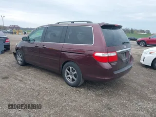 2007 Honda Odyssey Touring with VIN 5FNRL38847B048235, listed as a IAAI auction lot 41963652 with 176,412 mi miles. Bid and sale history available at carsss.com. Image 3.