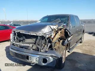2013 Ford F-150 XL with VIN 1FTFW1ET5DKE02740, listed as a IAAI auction lot 41808135 with 185,304 mi miles. Bid and sale history available at carsss.com. Image 2.