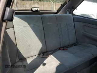 1992 Ford Escort z VIN 1FAPP11JXNW156984, wystawiony jako Copart lot #63462264 z przebiegiem 37 774 mil mil oraz Szkoda całkowita • Salvage title. Historia ofert i sprzedaży dostępna na DreamBid. Obrazek 10.