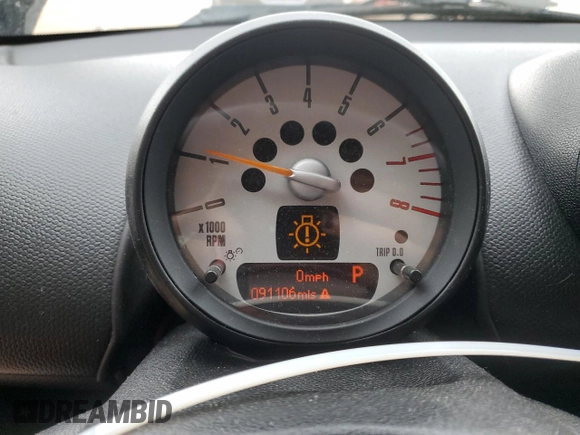 2014 MINI Countryman S with VIN WMWZC5C56EWP38065, listed as a Copart auction lot 59518395 with 91,106 mi miles and Salvage title. Bid and sale history available at DreamBid. Image 9.