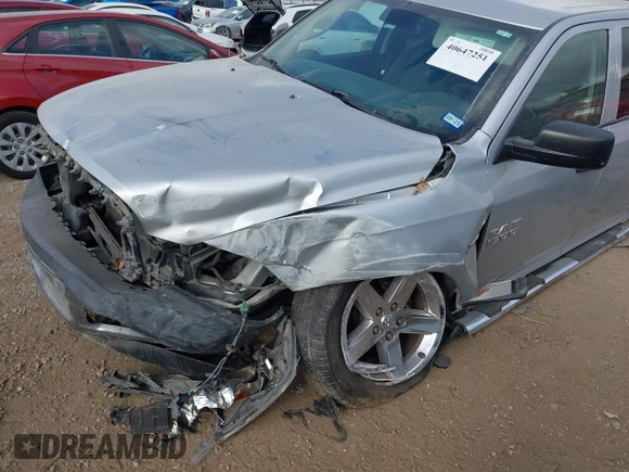 2013 Ram 1500 Tradesman z VIN 1C6RR6ST6DS661539, wystawiony jako IAAI lot #40647251 z przebiegiem 152 279 mil mil oraz . Historia ofert i sprzedaży dostępna na DreamBid. Obrazek 6.