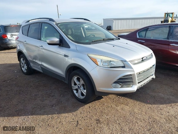 2014 Ford Escape SE with VIN 1FMCU9GX6EUB20308, listed as a IAAI auction lot 41818794 with 141,587 mi miles. Bid and sale history available at carsss.com. Image 1.