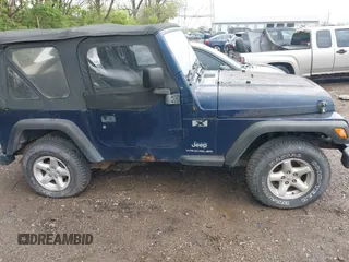 2006 Jeep Wrangler X with VIN 1J4FA39SX6P707937, listed as a IAAI auction lot 42128129 with 93,629 mi miles and . Bid and sale history available at DreamBid. Image 13.
