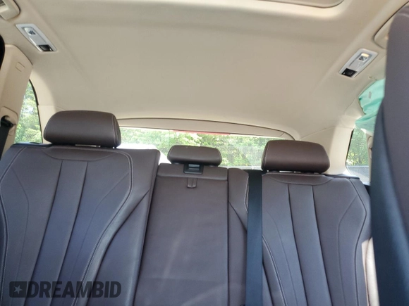 2015 BMW X5 xDrive35i z VIN 5UXKR0C53F0K61488, wystawiony jako Copart lot #57421645 z przebiegiem Nie podano mil oraz Szkoda całkowita • Salvage title. Historia ofert i sprzedaży dostępna na DreamBid. Obrazek 10.