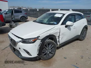 2018 Mazda CX-3 Touring z VIN JM1DKDC75J0326180, wystawiony jako IAAI lot #41787541 z przebiegiem 96 584 mil mil oraz . Historia ofert i sprzedaży dostępna na DreamBid. Obrazek 2.