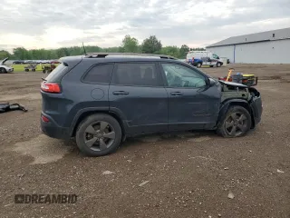 2016 Jeep Cherokee Altitude with VIN 1C4PJMCB0GW348615, listed as a Copart auction lot 61194105 with 124,840 mi miles and Salvage title. Bid and sale history available at DreamBid. Image 3.