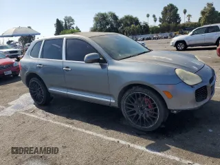 2005 Porsche Cayenne Turbo with VIN WP1AC29P65LA91187, listed as a Copart auction lot 65861054 with 186,084 mi miles and Salvage Title. Bid and sale history available at carsss.com. Image 4.