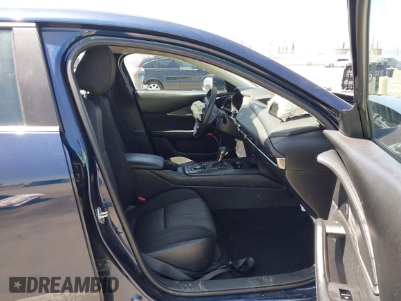 2021 Mazda CX-30 S with VIN 3MVDMAAL1MM270540, listed as a IAAI auction lot 42521513 with 63,993 mi miles and . Bid and sale history available at DreamBid. Image 5.