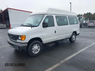 2005 Ford Econoline Cargo with VIN 1FTNE24W25HA14010, listed as a IAAI auction lot 41947382 with Not provided miles and . Bid and sale history available at DreamBid. Image 2.