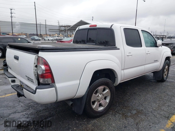 2009 Toyota Tacoma PreRunner with VIN 3TMJU62NX9M078106, listed as a IAAI auction lot 41768489 with 83,360 mi miles. Bid and sale history available at carsss.com. Image 4.