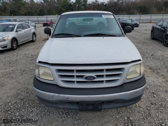 1999 Ford F-150 Work Series with VIN 1FTRF17W1XNA20017, listed as a Copart auction lot 84550234 with 0 mi miles and Salvage Title. Bid and sale history available at carsss.com. Image 5.