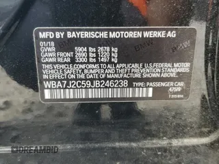 2018 BMW 7 Series 740e xDrive with VIN WBA7J2C59JB246238, listed as a Copart auction lot 53777335 with 76,642 mi miles and Salvage Title. Bid and sale history available at carsss.com. Image 12.