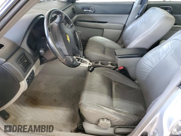 2004 Subaru Forester XS z VIN JF1SG65614H757524, wystawiony jako Copart lot #57094535 z przebiegiem 184 864 mil mil oraz Szkoda całkowita • Salvage title. Historia ofert i sprzedaży dostępna na DreamBid. Obrazek 7.