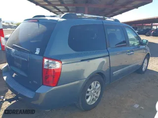 2006 Kia Sedona LX with VIN KNDMB233866096107, listed as a IAAI auction lot 41876430 with 148,634 mi miles. Bid and sale history available at carsss.com. Image 4.