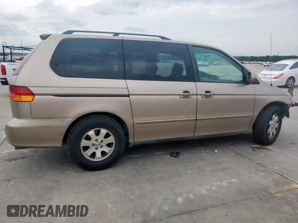 2004 Honda Odyssey EX-L with VIN 5FNRL18944B107051, listed as a Copart auction lot 58542335 with 207,951 mi miles and Salvage title. Bid and sale history available at DreamBid. Image 3.