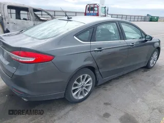 2017 Ford Fusion SE with VIN 3FA6P0H7XHR228922, listed as a IAAI auction lot 42162345 with 186,000 mi miles and . Bid and sale history available at DreamBid. Image 4.