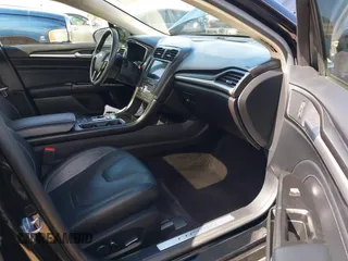 2017 Ford Fusion Titanium with VIN 3FA6P0SU0HR277268, listed as a IAAI auction lot 41798990 with 140,452 mi miles and . Bid and sale history available at DreamBid. Image 5.