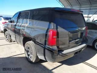 2017 Chevrolet Tahoe Commercial with VIN 1GNLCDEC8HR385630, listed as a IAAI auction lot 41262095 with 182,011 mi miles. Bid and sale history available at carsss.com. Image 3.