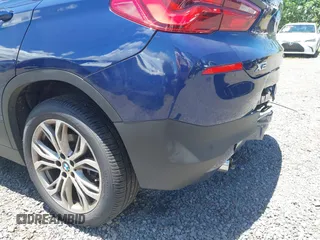 2020 BMW X2 sDrive28i with VIN WBXYH9C05L5P25132, listed as a IAAI auction lot 42269935 with 55,508 mi miles and . Bid and sale history available at DreamBid. Image 18.