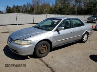 2002 Honda Accord LX z VIN 1HGCG56402A160961, wystawiony jako Copart lot #53092205 z przebiegiem 262 152 mil mil oraz Czysty tytuł • Clean title. Historia ofert i sprzedaży dostępna na DreamBid. Obrazek 1.