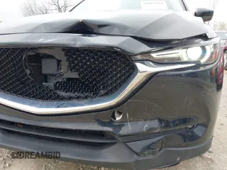2018 Mazda CX-5 Grand Touring with VIN JM3KFBDM3J0384431, listed as a IAAI auction lot 42013474 with 65,018 mi miles. Bid and sale history available at carsss.com. Image 20.