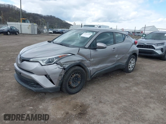 2019 Toyota C-HR XLE with VIN NMTKHMBX7KR079751, listed as a IAAI auction lot 42013399 with 74,665 mi miles. Bid and sale history available at carsss.com. Image 2.