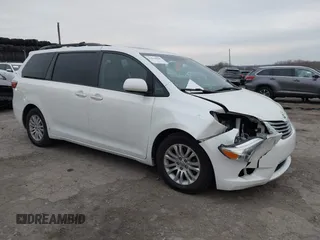 2015 Toyota Sienna XLE with VIN 5TDYK3DC9FS595827, listed as a IAAI auction lot 41014820 with 119,143 mi miles. Bid and sale history available at carsss.com. Image 1.